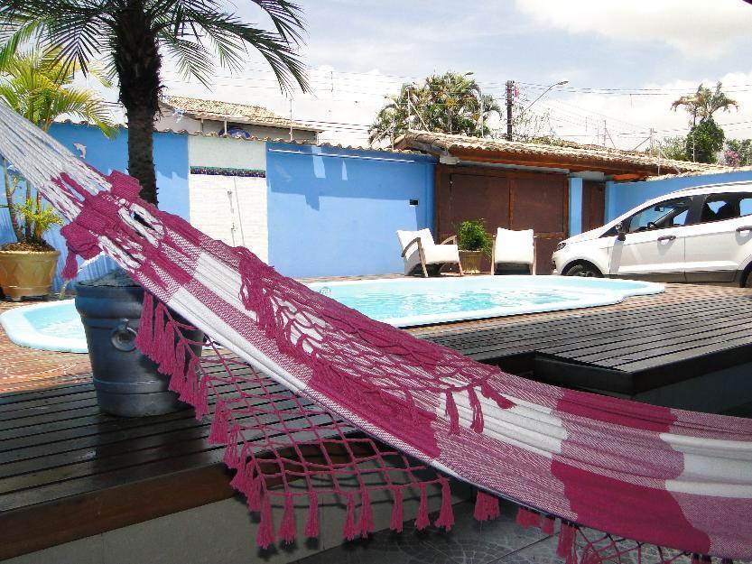 Casa com piscina , churrasqueira centro de caraguatatuba
