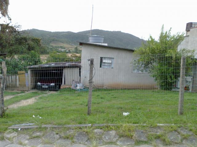 Terreno com casa