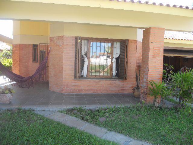 Casa com 04 dormitórios em