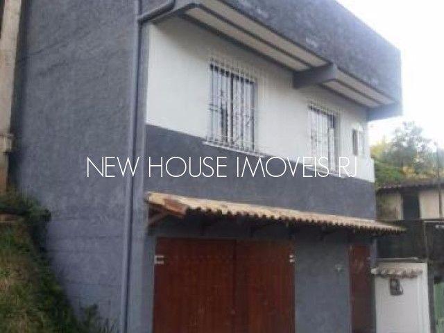Casa de 3 quartos e garagem em beira de rua R 130 mil (não aceita cef)