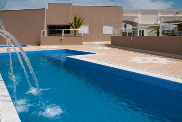 Alpha Club-03 Quartos-Frente pra Piscina