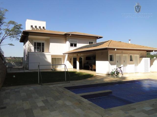 Belíssima casa em condomínio com 4 suítes, Jardim Caxambu,