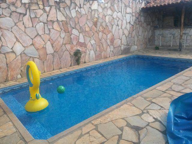 Casa pé na areia de frente para o mar