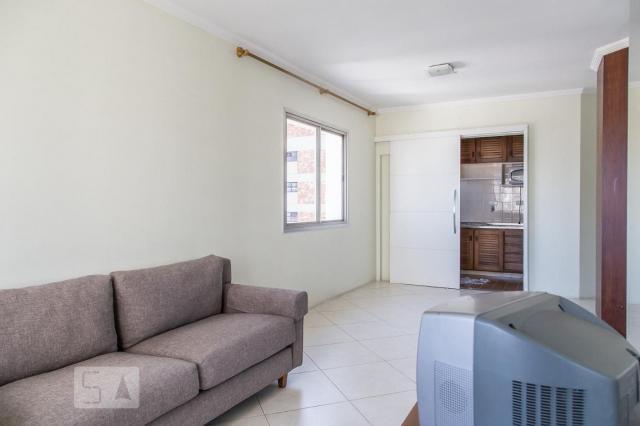 APARTAMENTO no 16º andar mobiliado com 1 dormitório e 1 garagem