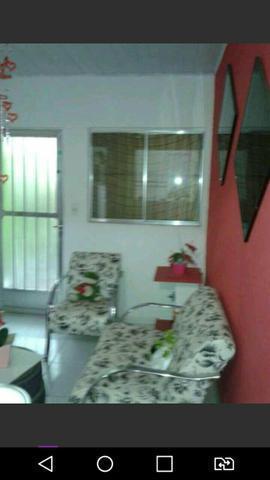 Vendo 3 lojas com 2 casas rua Nilza