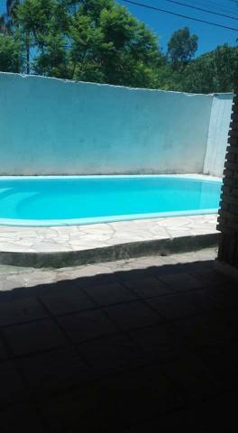 Casa com piscina, Laranjal
